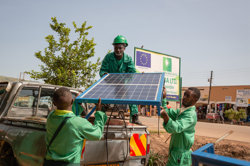 Team members at Isingiro Energy Store organise materials for an installation.